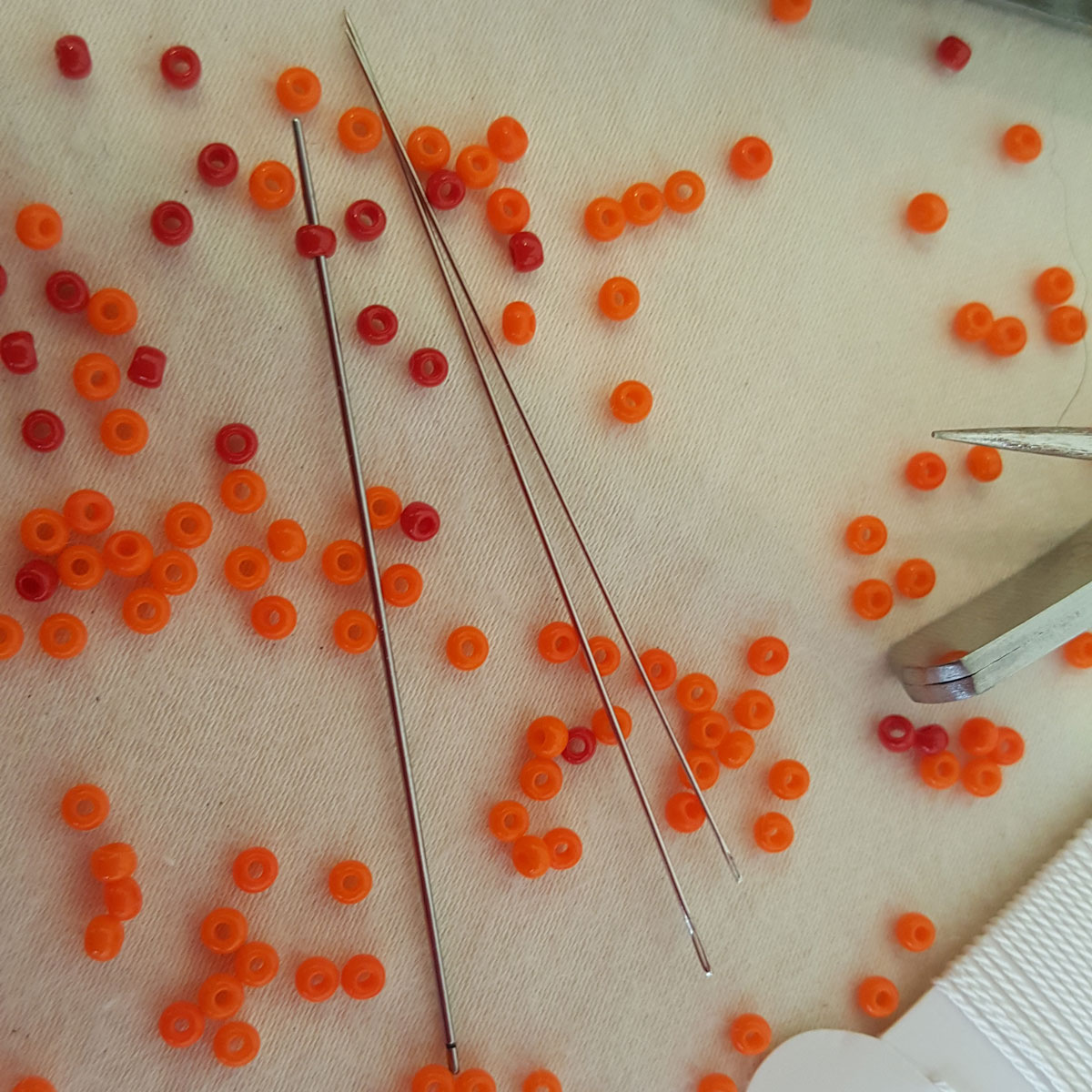 Beading needles with seed beads