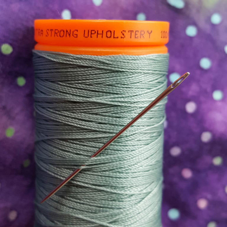 Upholstery thread with a Spiral Eye Needle